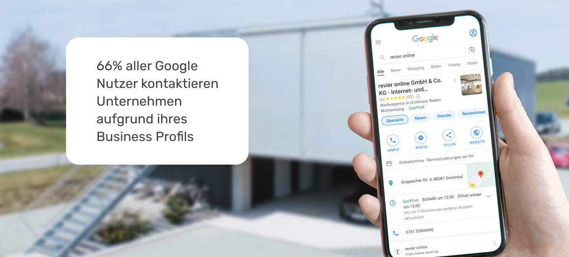revier Google my Business Eintrag auf Handy vor Firmengebaeude